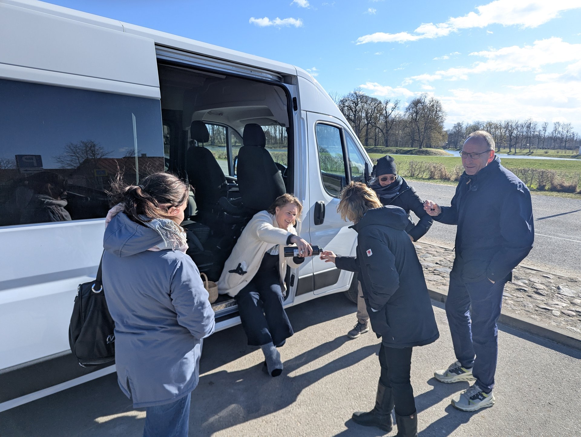 Daiga handing out a tasting at the side door of the Barefoot Baltic van