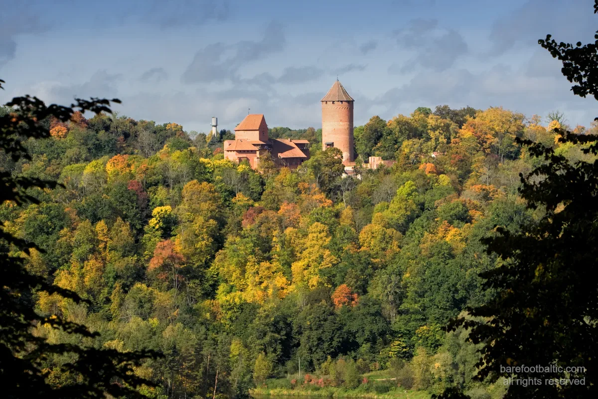 Cēsis Castle ruins in autumn forest, the second castle in the Sigulda day