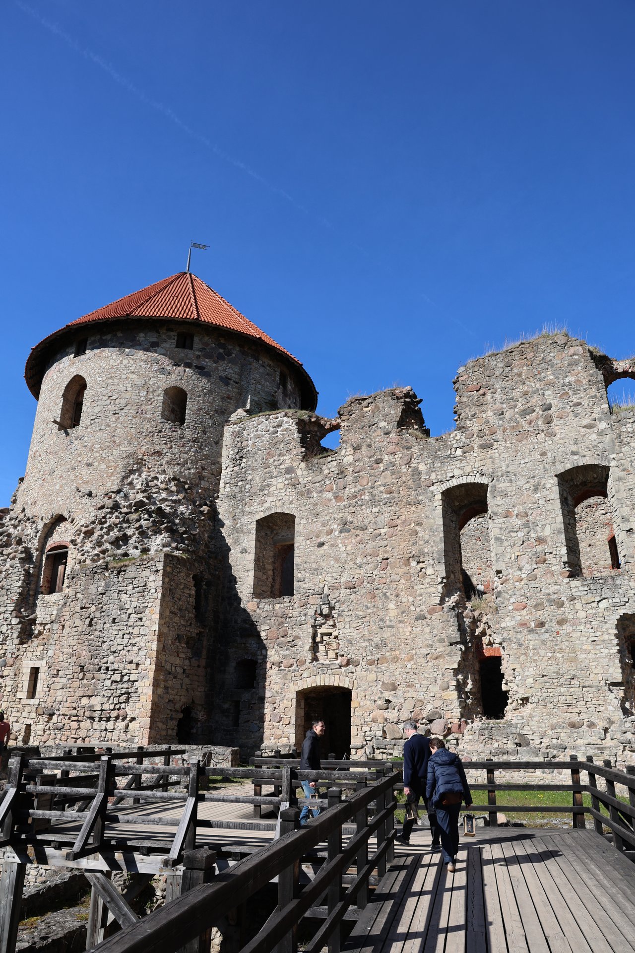 Cēsis Medieval Castle towers, with the wooden boardwalk through the ruins