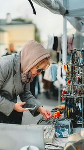 Flea Market Woman Shopping in Riga