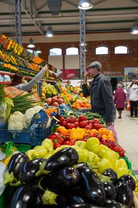 Market Man Buying in Riga