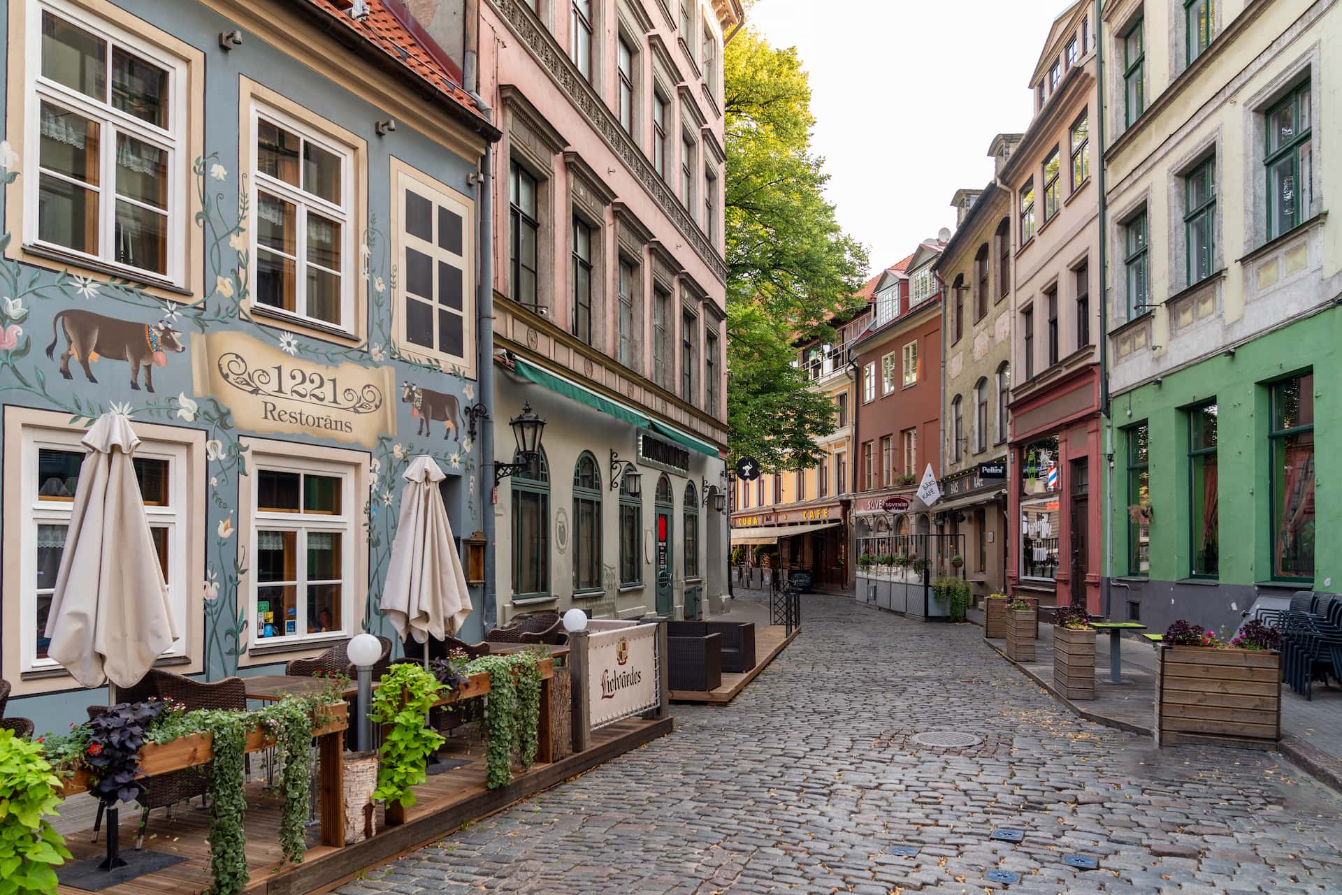 Cobblestone street with restaurants in Riga Old Town